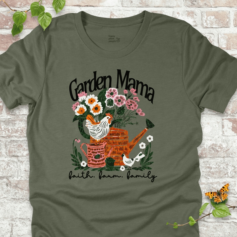 Garden Mama Mother's Day T-shirt with hen, flowers, watering can, and "faith. farm. family." slogan printed on a soft green shirt.