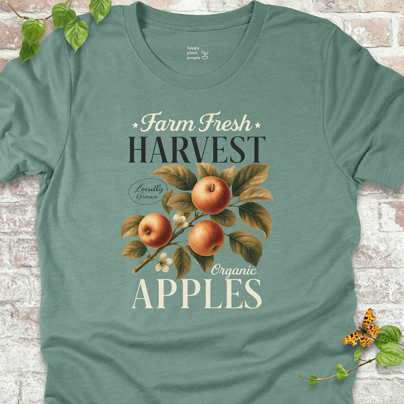 Soft blue Bella+Canvas tee with rustic apple artwork. Lightweight and breathable for orchard strolls and fall layering.
