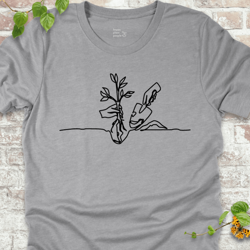 Minimalist planting illustration on a light grey T-shirt