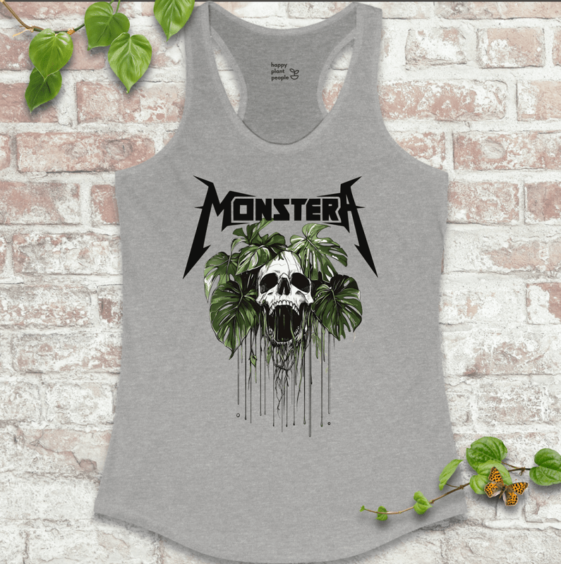 Ladies racerback tank top in heather grey with a bold skull and Monstera leaf design. Sleeveless houseplant shirt for plant lovers with attitude.
