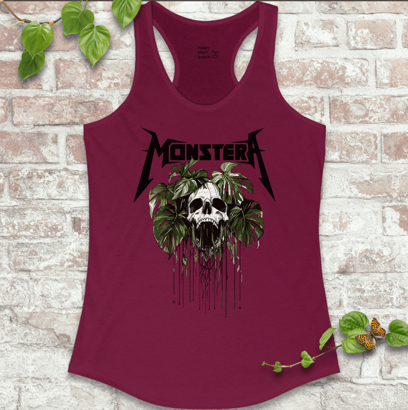 Ladies racerback tank top in dark red with a bold skull and Monstera leaf design. Sleeveless houseplant shirt for plant lovers with attitude.