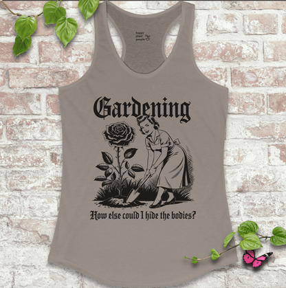 Ladies racerback tank top in grey with “Hide the Bodies” text and garden tools graphic. Funny sleeveless shirt for women who love gardening.
