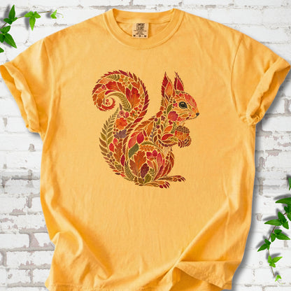 Bay Comfort Colors® T-shirt flat lay with an autumn squirrel graphic made from colorful leaves, ferns and flowers.