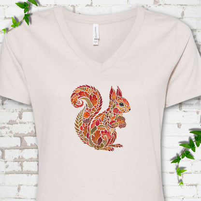 Athletic Heather Bella Canvas® V-neck T-shirt flat lay with an autumn squirrel graphic made from colorful leaves, ferns and flowers.
