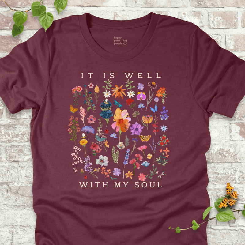 Maroon It Is Well With My Soul floral T shirt laid flat
