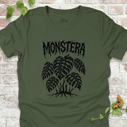 Monstera T-shirt with gothic lettering and Monstera leaves on military green fabric, flat lay with vine accents