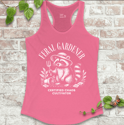 Ladies racerback tank top in pink with “Feral Gardener – Certified Chaos Cultivator” and raccoon graphic. Funny sleeveless garden shirt for plant lovers.