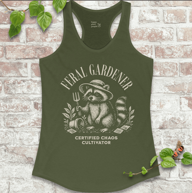 Ladies racerback tank top in military green with “Feral Gardener – Certified Chaos Cultivator” and raccoon graphic. Funny sleeveless garden shirt for plant lovers.

