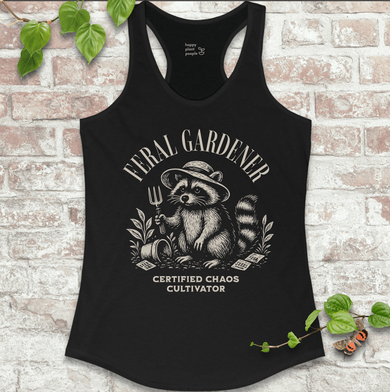 Ladies racerback tank top in black with “Feral Gardener – Certified Chaos Cultivator” and raccoon graphic. Funny sleeveless garden shirt for plant lovers.