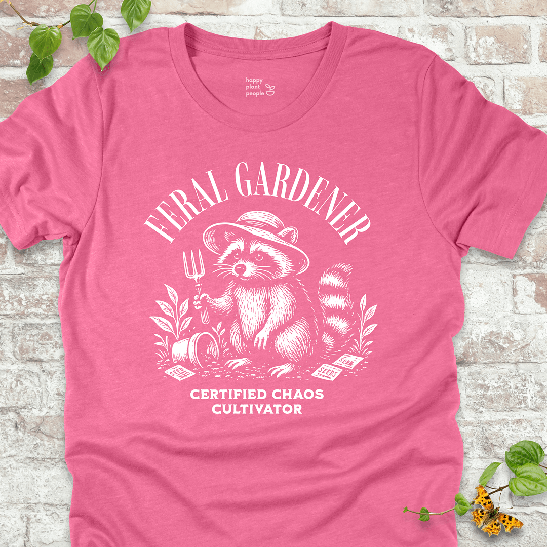 Pink gardening T-shirt with vintage raccoon and “Certified Chaos Cultivator” slogan. Funny gift for plant lovers and gardeners.