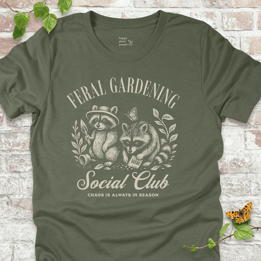 Green gardening tee with raccoon design and funny chaos quote. Ideal gift for gardeners and nature lovers