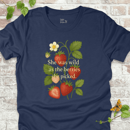 She Was Wild T-Shirt in Navy, featuring strawberries, green leaves, and the quote 'She was wild as the berries she picked' on soft Bella+Canvas tee