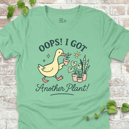 Got Another Plant T-Shirt – silly goose holding houseplants with fun garden quote on mint shirt