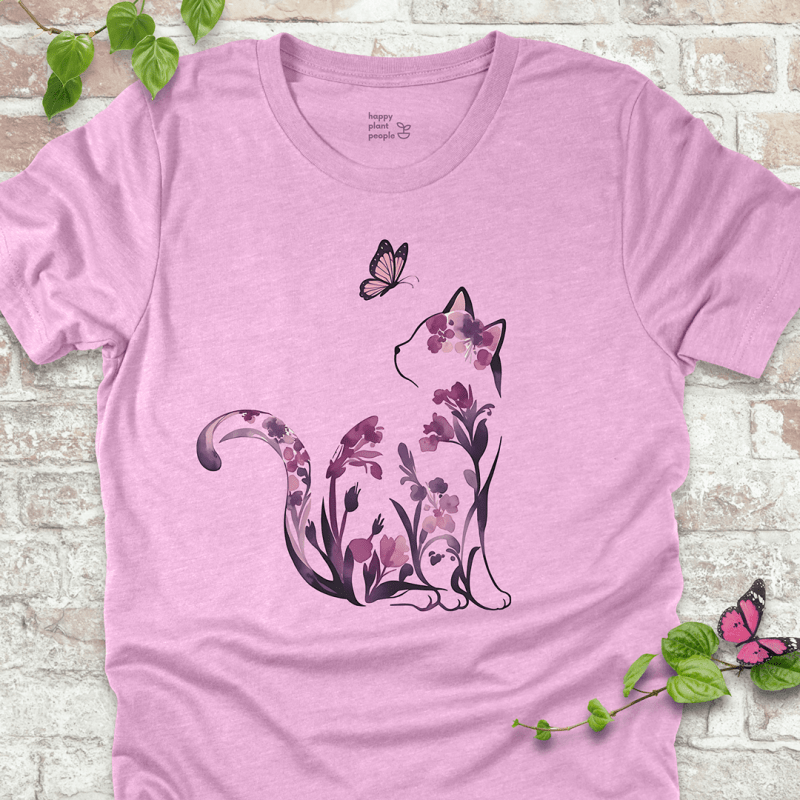 Ladies T-shirt in lilac with a floral cat illustration. Whimsical garden-themed shirt for cat lovers and flower fans.