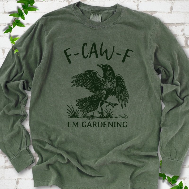 Hemp Comfort Colors® long sleeve T-shirt flat lay featuring a black crow with F-CAW-F I'm Gardening text.