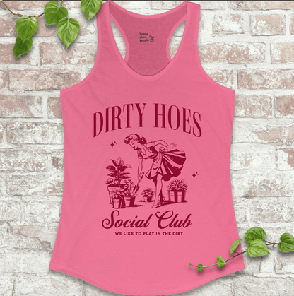 Ladies racerback tank top in pink with “Dirty Hoes Social Club” and vintage garden tool graphic. Funny sleeveless shirt for women who love gardening.

