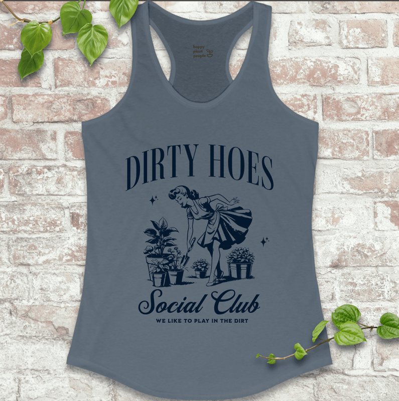 Ladies racerback tank top in blue with “Dirty Hoes Social Club” and vintage garden tool graphic. Funny sleeveless shirt for women who love gardening.

