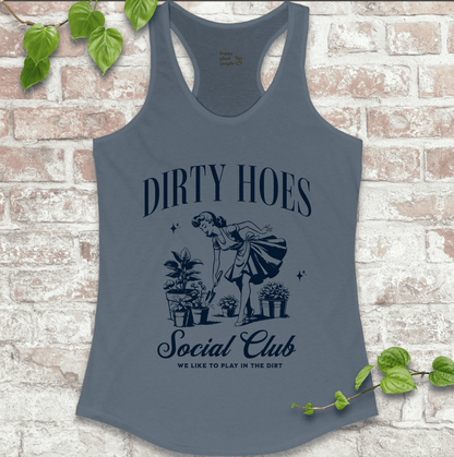 Ladies racerback tank top in blue with “Dirty Hoes Social Club” and vintage garden tool graphic. Funny sleeveless shirt for women who love gardening.

