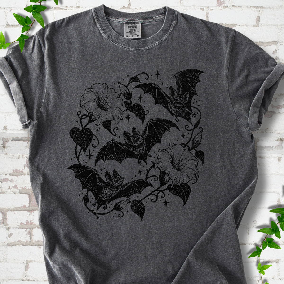 Bats In Bloom botanical bat T-shirt in Pepper with black bats and trumpet flowers