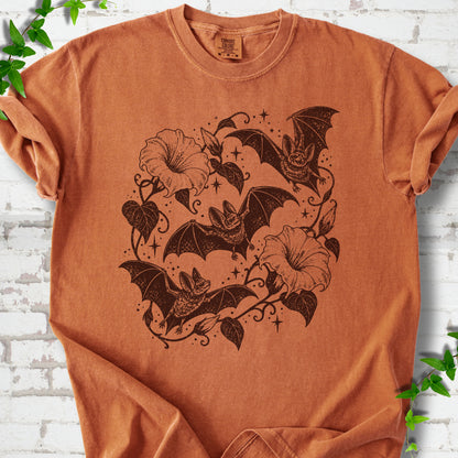 Bats In Bloom botanical bat T-shirt in Yam with black bats and trumpet flowers