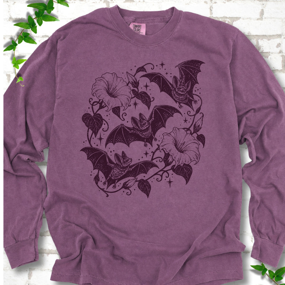 Bats In Bloom botanical bat long sleeve shirt in Berry with black bats and trumpet flowers
