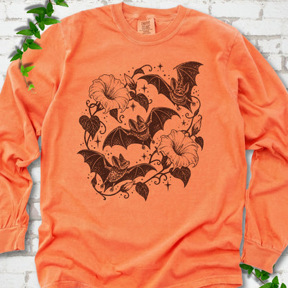 Bats In Bloom botanical bat long sleeve shirt in Melon with black bats and trumpet flowers