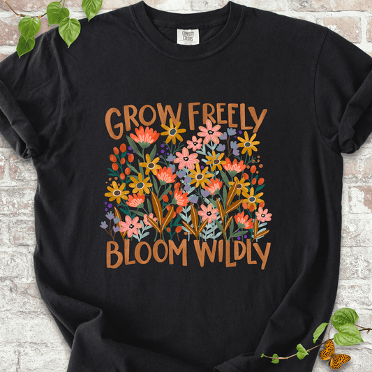 Comfort Colors™ T-shirt in Black with wildflower graphic for plant lovers