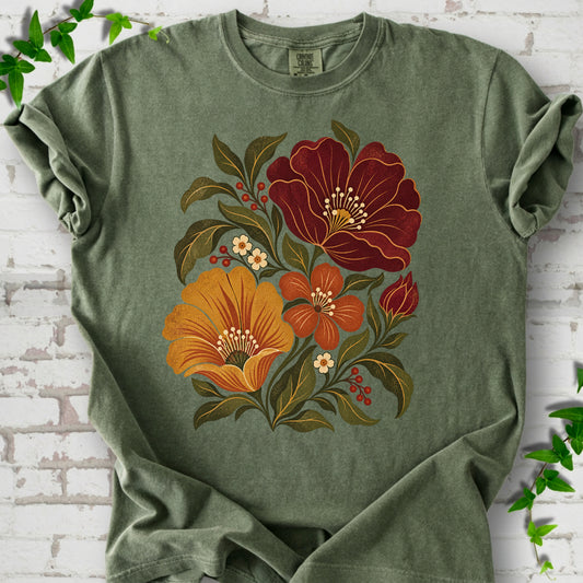 Moss T-shirt front-view mockup with a large burgundy, ochre and rust retro floral graphic.
