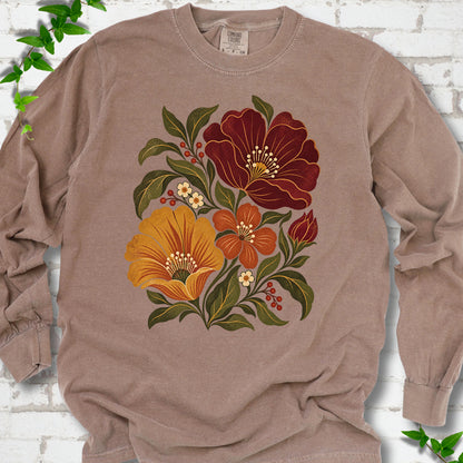 Espresso long sleeve T-shirt front-view mockup with a large burgundy, ochre and rust retro floral graphic.