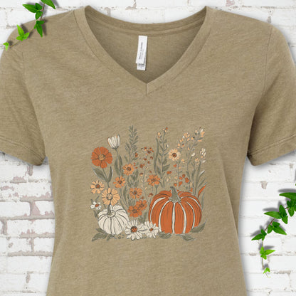 Heather Olive Bella Canvas® V-neck T-shirt flat lay featuring an orange pumpkin surrounded by cream and orange wildflowers.