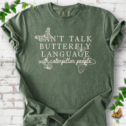 Moss Comfort Colors® T-shirt featuring a cream Can't Talk Butterfly Language with Caterpillar People graphic with butterflies