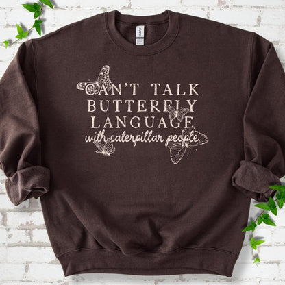 Dark Chocolate classic sweatshirt featuring a cream Can't Talk Butterfly Language with Caterpillar People graphic with butterflies