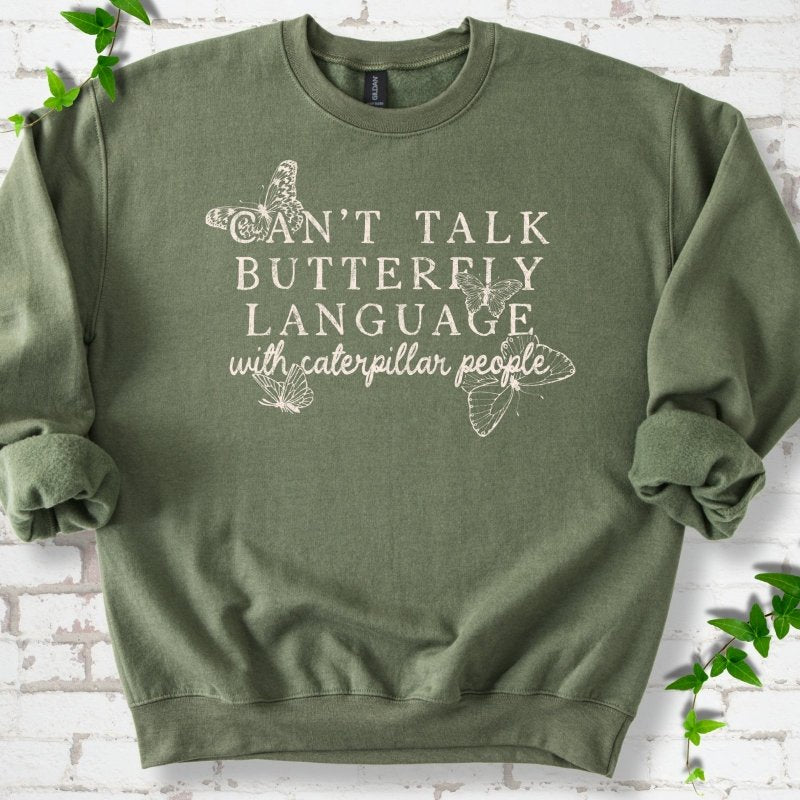 Military Green classic sweatshirt featuring a cream Can't Talk Butterfly Language with Caterpillar People graphic with butterflies
