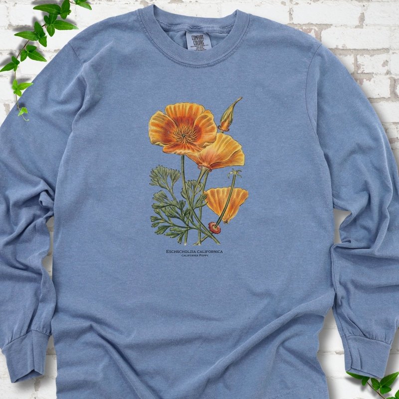 Blue Jean Comfort Colors® long sleeve T-shirt flat lay featuring a vintage botanical California poppy illustration.