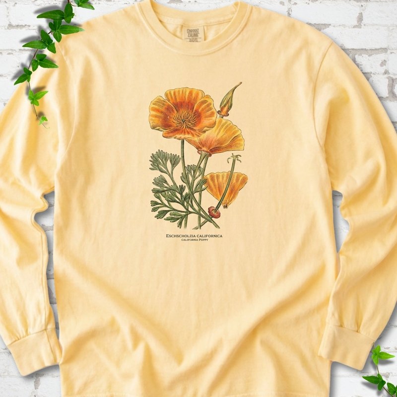 Butter Comfort Colors® long sleeve T-shirt flat lay featuring a vintage botanical California poppy illustration.