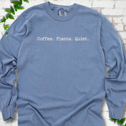 Blue Jean Comfort Colors® long sleeve T-shirt showing the Coffee. Plants. Quiet. text design