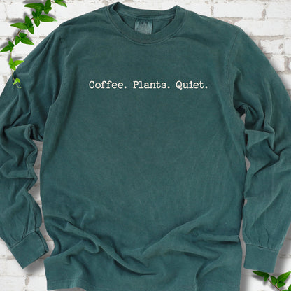 Blue Spruce Comfort Colors® long sleeve T-shirt showing the Coffee. Plants. Quiet. text design