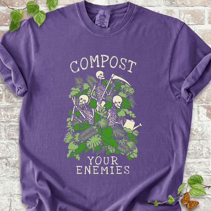 Compost Your Enemies Skeleton graphic on a Comfort Colors™ Pepper T-shirt – spooky garden design with skeletons, compost pile, and fall plants