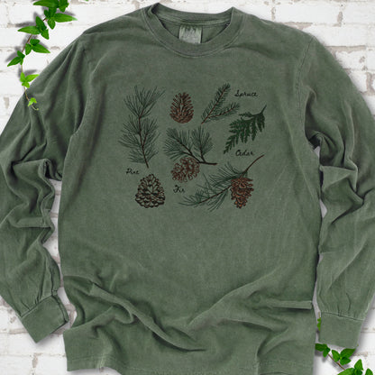 Hemp Comfort Colors® long sleeve T-shirt shown flat with a botanical chart of pine, spruce, cedar and fir cones and needles