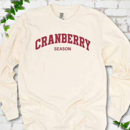 Ivory Comfort Colors® long sleeve T-shirt with red collegiate-style Cranberry Season lettering