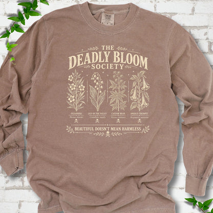 Espresso Comfort Colors® long sleeve T-shirt flat lay featuring The Deadly Bloom Society poisonous plant design.