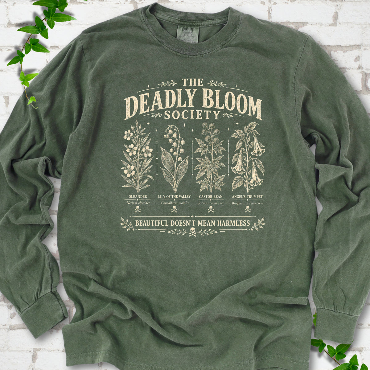 Hemp Comfort Colors® long sleeve T-shirt flat lay featuring The Deadly Bloom Society poisonous plant design.