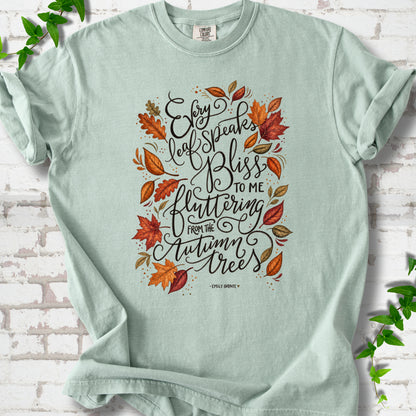 Bay Comfort Colors® T-shirt flat lay with the Every Leaf Speaks Bliss Emily Brontë quote and autumn leaves.