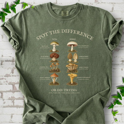 Moss Comfort Colors® 1717 T-shirt flat lay with the Fatal Fungi mushroom spot-the-difference design