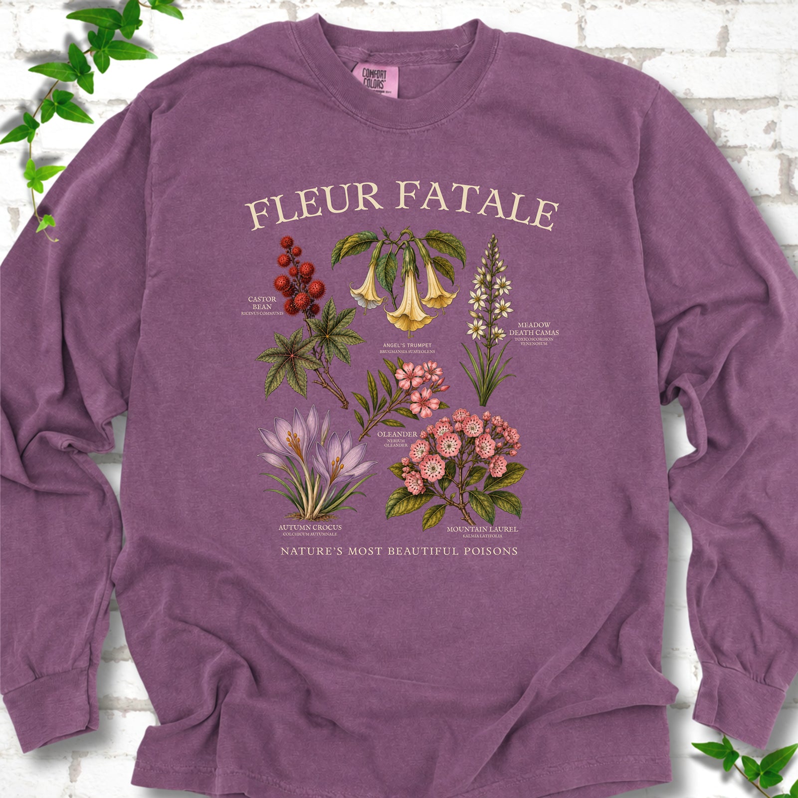 Berry Comfort Colors® long sleeve T-shirt flat lay featuring a Fleur Fatale botanical chart of six poisonous flowering plants.