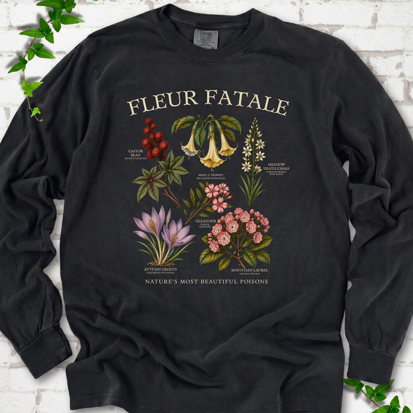 Black Comfort Colors® long sleeve T-shirt flat lay featuring a Fleur Fatale botanical chart of six poisonous flowering plants.