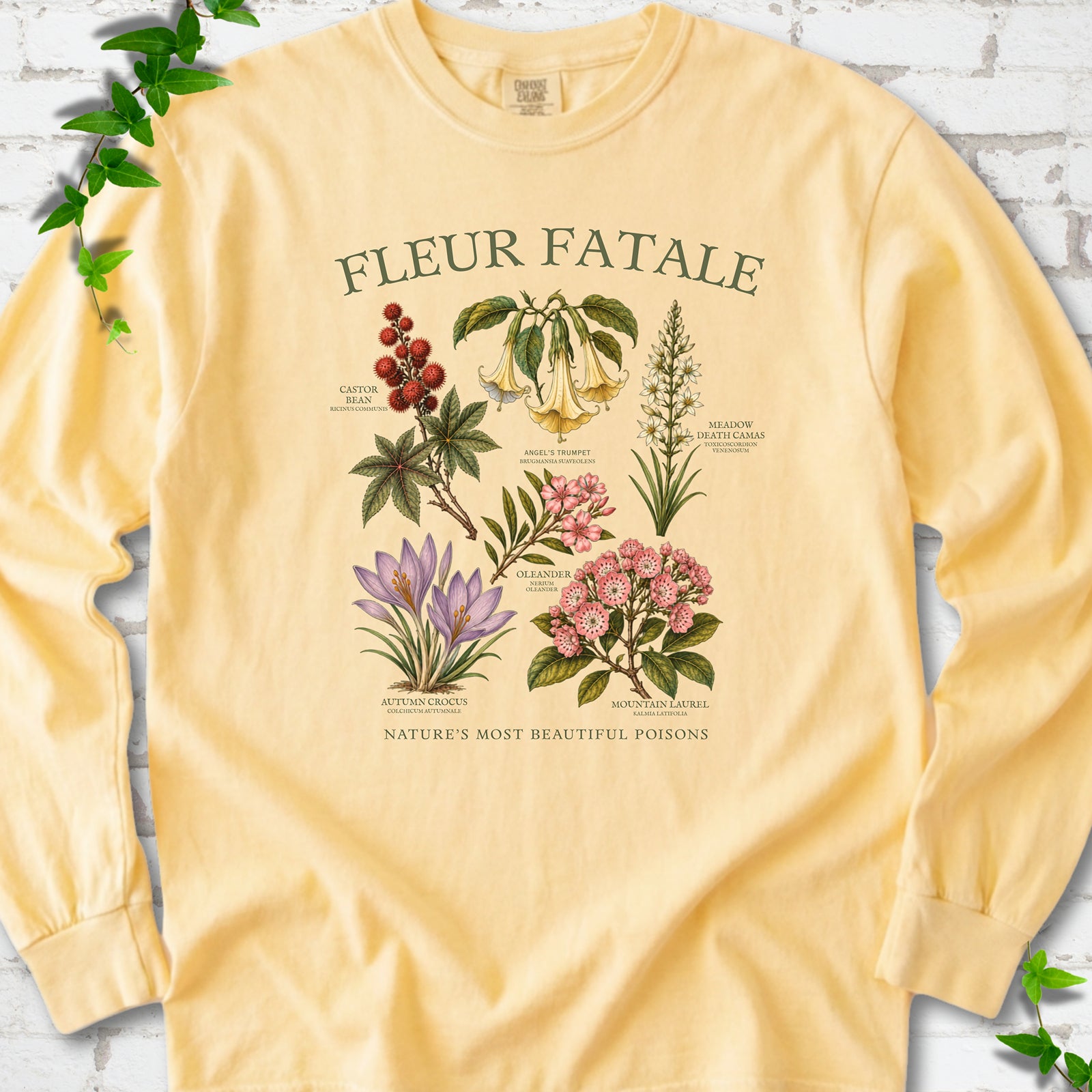 Butter Comfort Colors® long sleeve T-shirt flat lay featuring a Fleur Fatale botanical chart of six poisonous flowering plants.