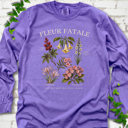 Violet Comfort Colors® long sleeve T-shirt flat lay featuring a Fleur Fatale botanical chart of six poisonous flowering plants.