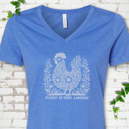 Heather True Royal Bella Canvas® V-neck T-shirt with cream floral hen and Fluent in Fowl Language text