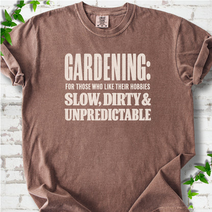 Espresso Comfort Colors® T-shirt with white “Gardening: For Those Who Like Their Hobbies Slow, Dirty & Unpredictable” typography